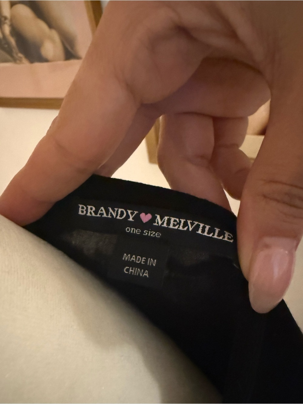 Brandy Melville black mini dress with pink heart label